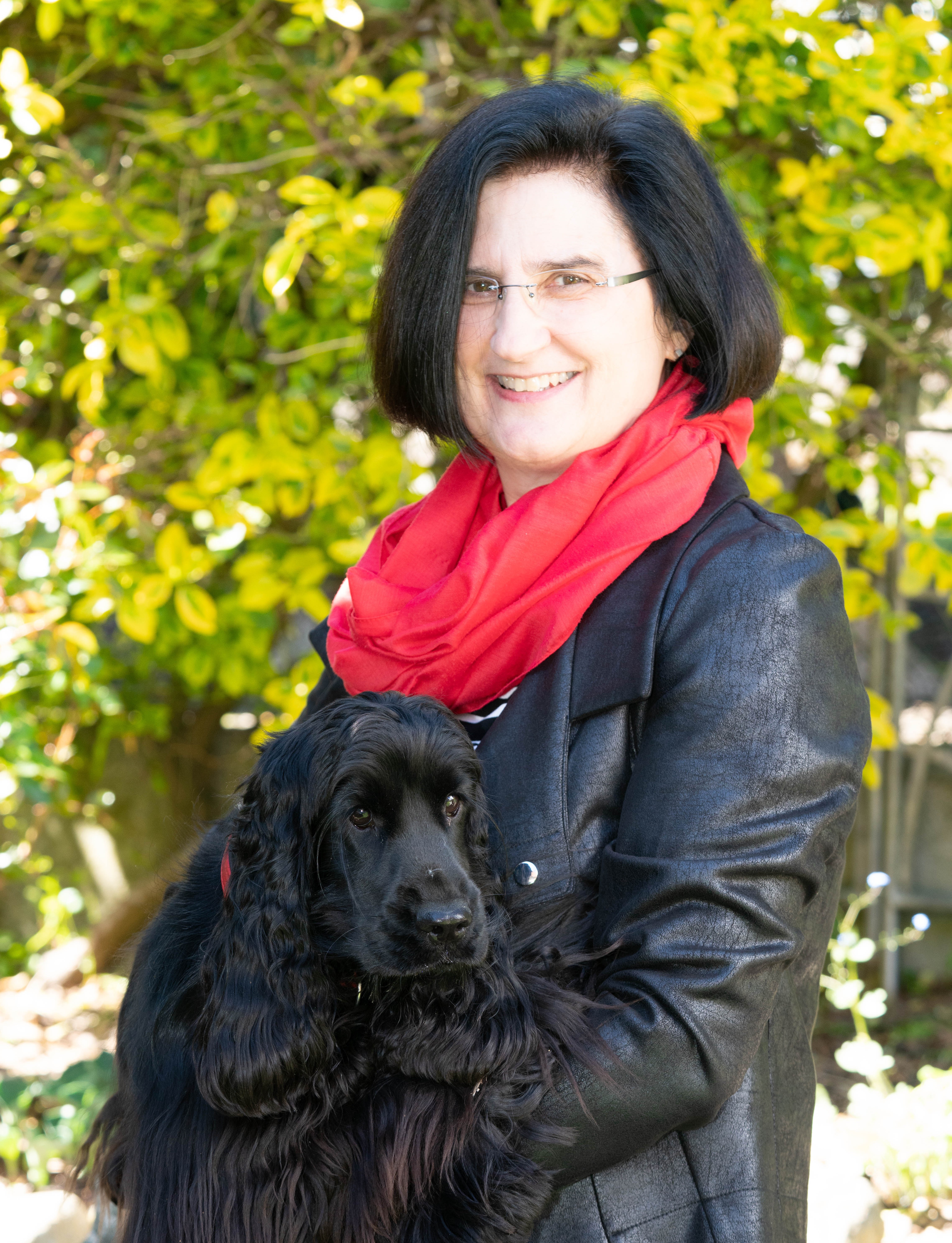 Bild von Christiane mit ihrem schwarzen Cocker Spaniel Seraphina